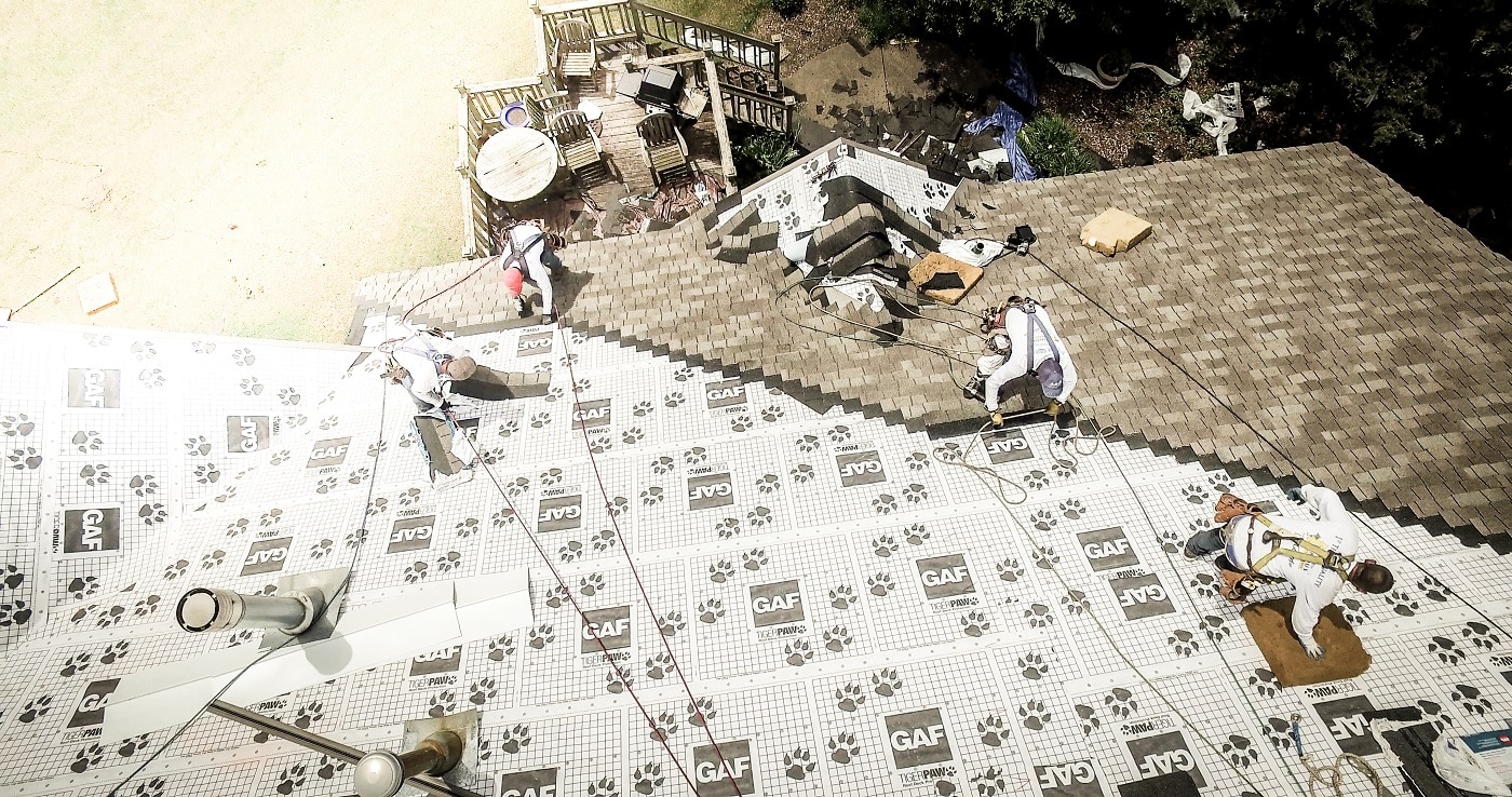 asphalt installation with roof deck protection layer