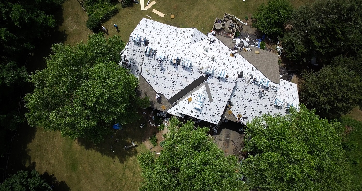 Roof being installed on a Minnesota home by Lindus Construction
