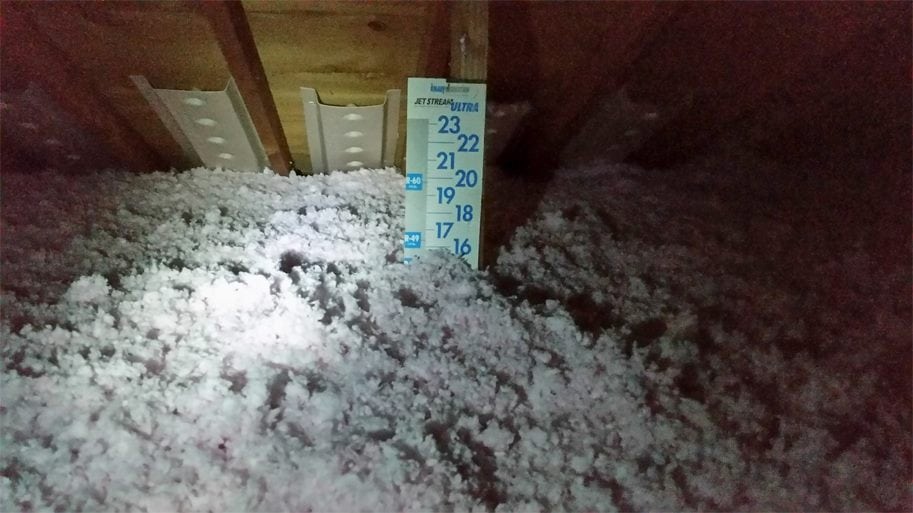 attic with blown-in insulation