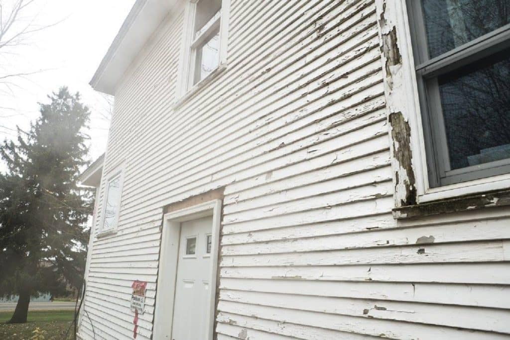 wood siding that needs replacement