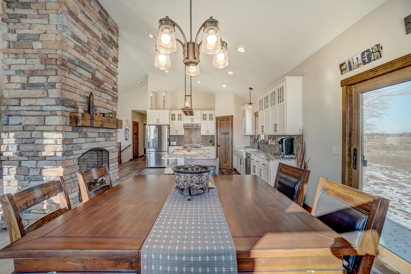 chandelier light above dining room table