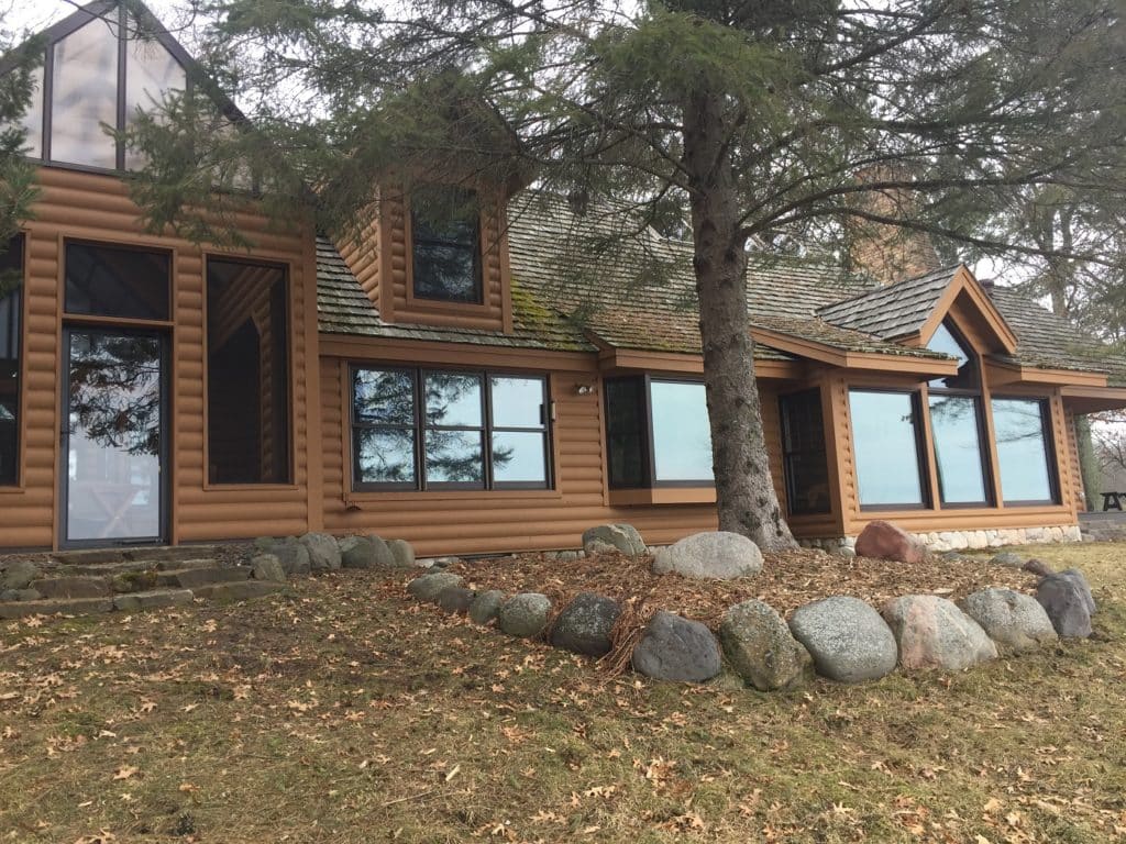 webster, wi lake home prior to metal roof