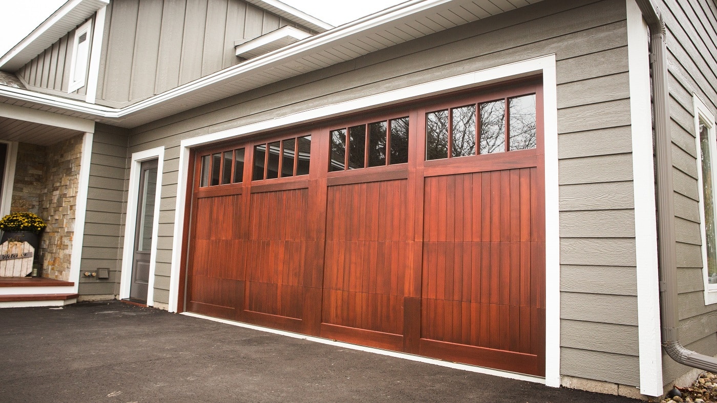 new wooden garage door installation by Lindus Construction