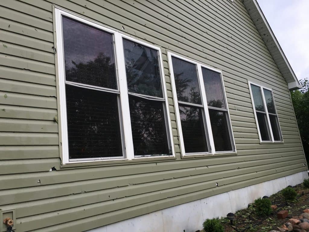hail damage to vinyl siding