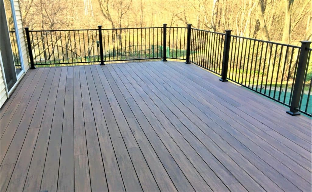 maintenance free deck material with a steel railing