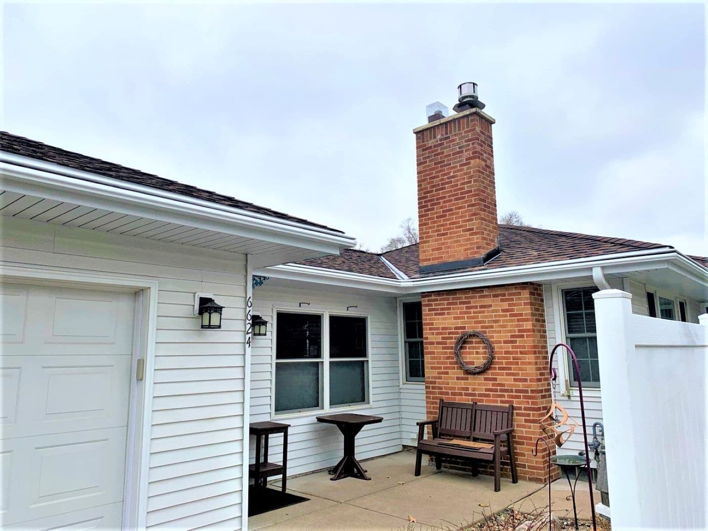 Home featuring GAF asphalt shingles, LeafGuard® Brand Gutters, soffit and fascia