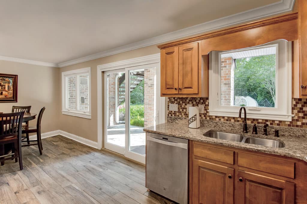 Marvin Infinity sliding French door with casement windows in a kitchen.