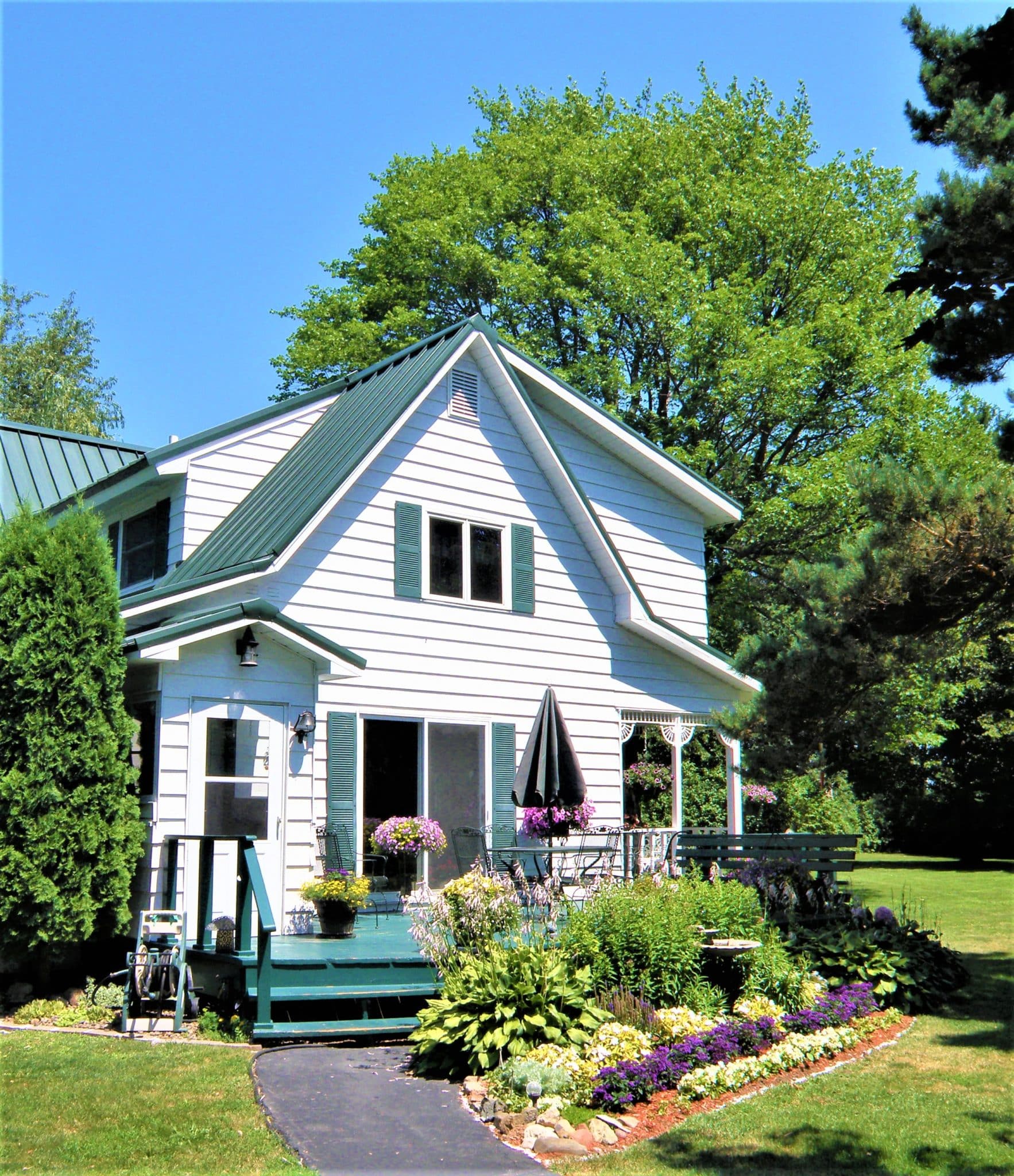 Green metal roofing installed on Dresser, WI home 
