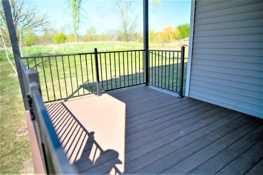 TimberTech deck with a steel railing.