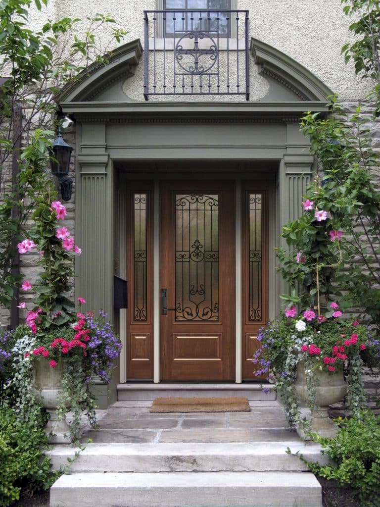 Beautiful front door with flowers.